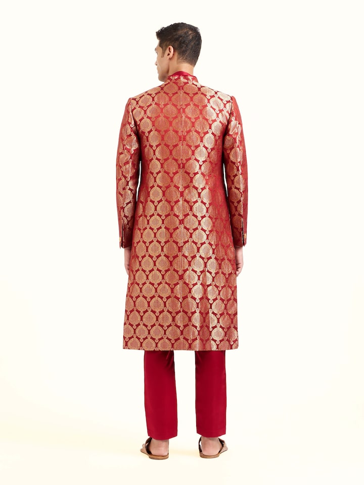 Back view of maroon silk Banarasi butidar sherwani with refined finishing