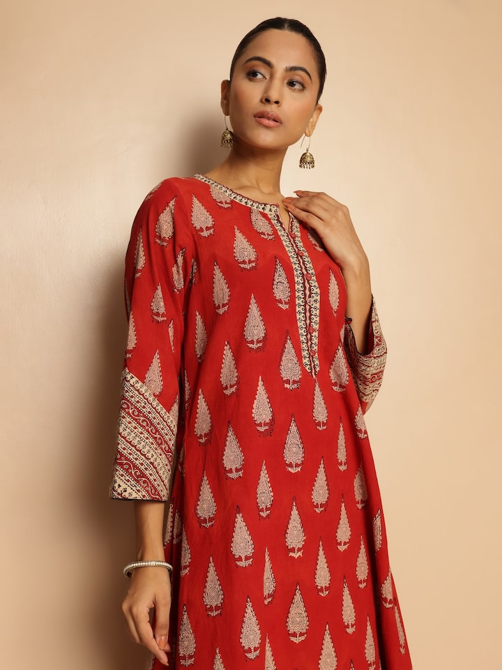 Angled shot for a comprehensive view of the kurta’s flow and style.