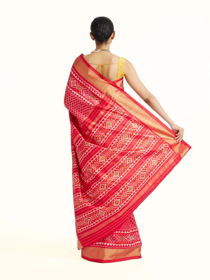 back view of red weft ikat silk saree