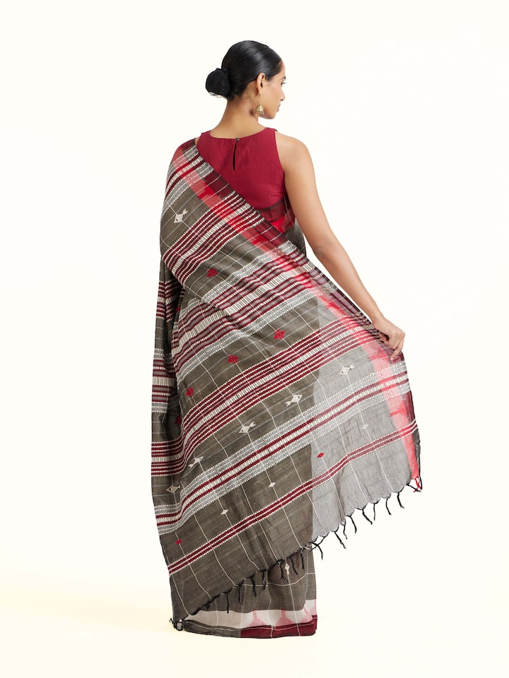 Back view of Brown Cotton Tussar Silk Kotpad Saree emphasizing the overall design and fine details