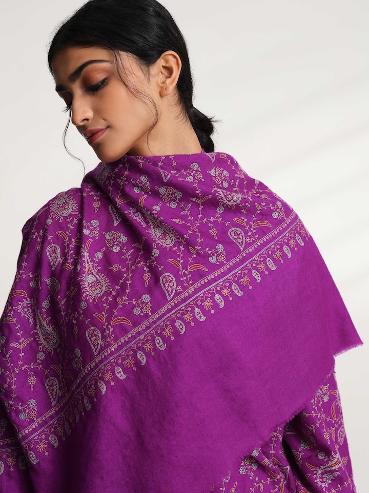 Detail view of purple jalidar sozni embroidered shawl showing fine embroidery