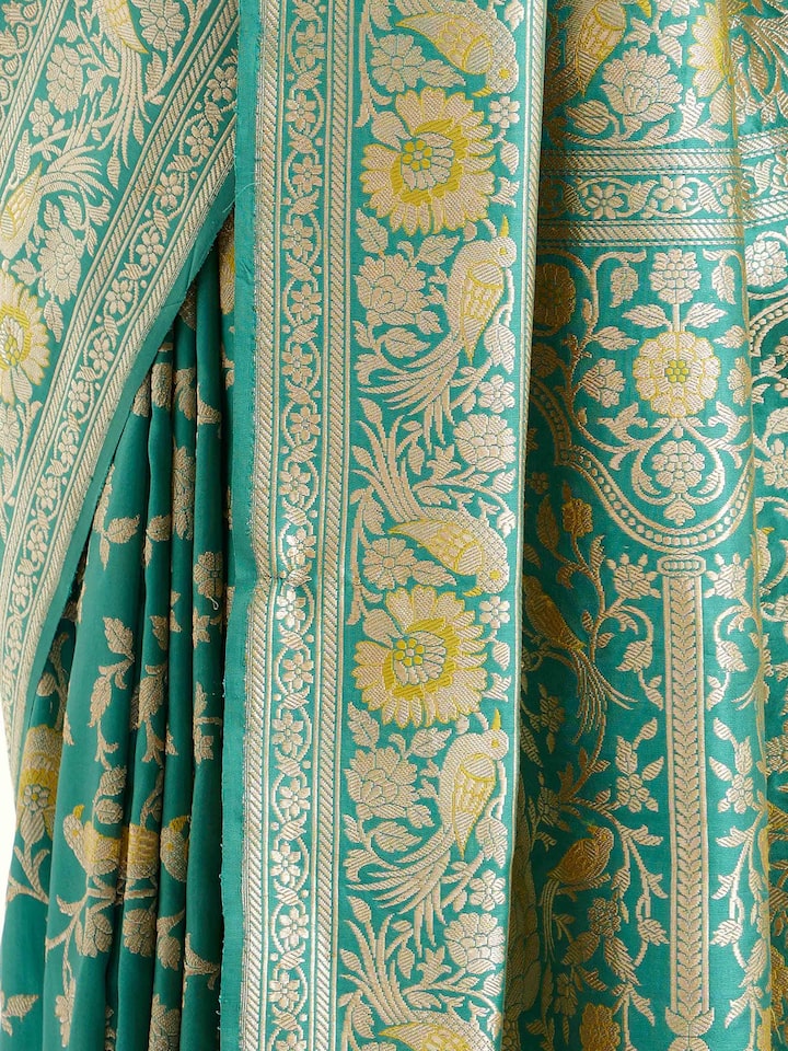 Detail view of sea blue mulberry katan silk Banarasi saree showing silk texture and zari craftsmanship