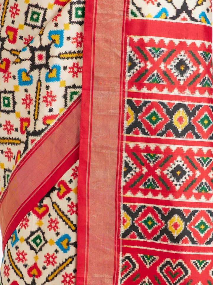 Detailed view of Cream Double Ikat Silk Saree focusing on the fine craftsmanship and texture