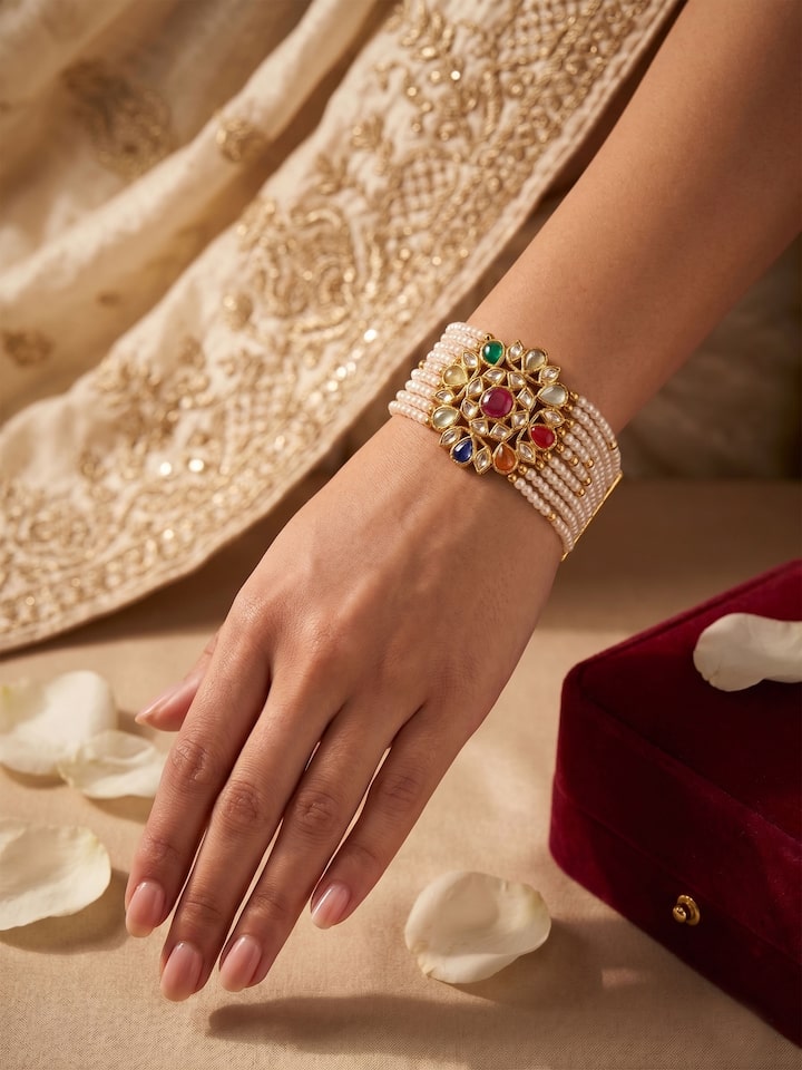 Alternate lifestyle view of the Jadau Navaratna 18 Karat Gold Bracelet