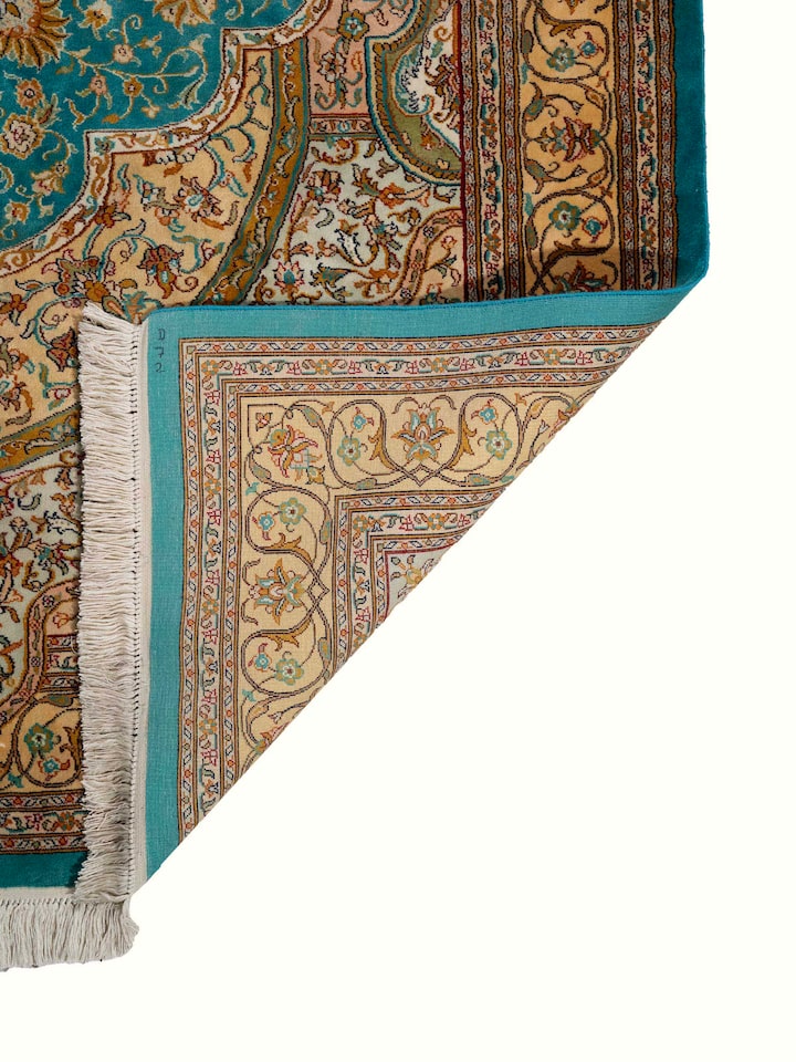 Back view of Traditional Persian Blue Tabriz Kashmir Silk Hand-Knotted Carpet showing the reverse weave