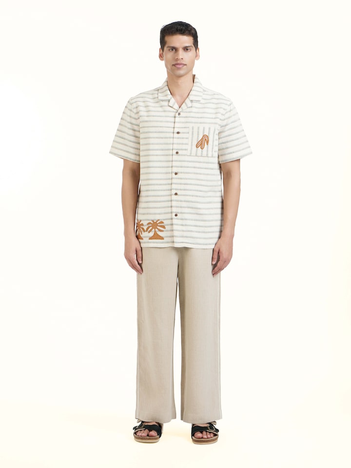 Front view of Ivory Kutchi Embroidered Shirt showcasing its traditional craftsmanship and design