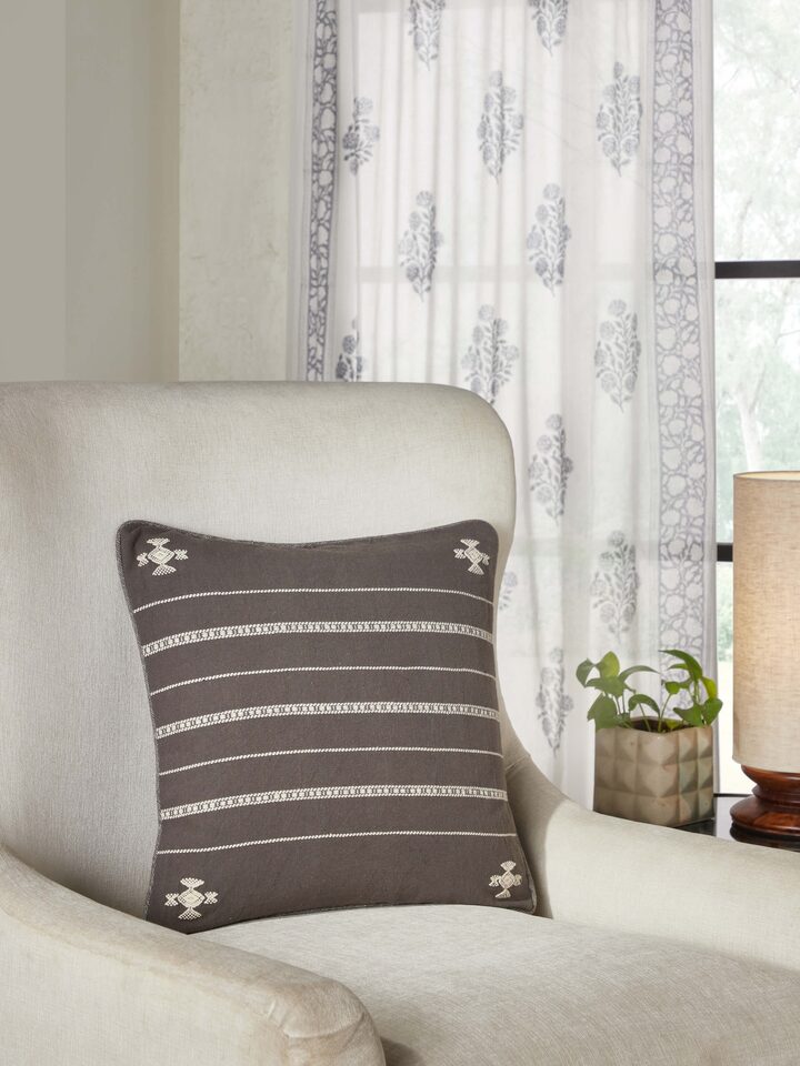 Top view showcasing the full cushion cover design and intricate cotton weave
