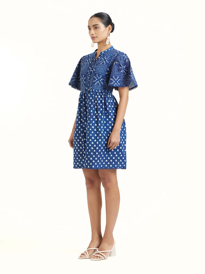 Side view of Aarnika cotton dabu block printed dress highlighting relaxed silhouette