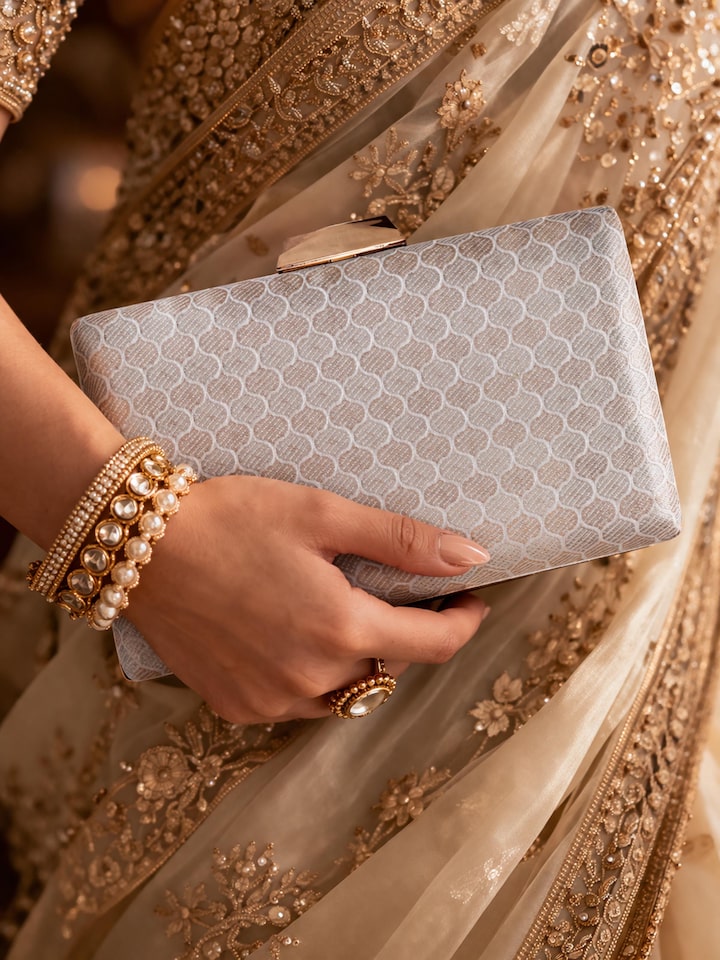 Side view of the Silver Handwoven Brocade Clutch