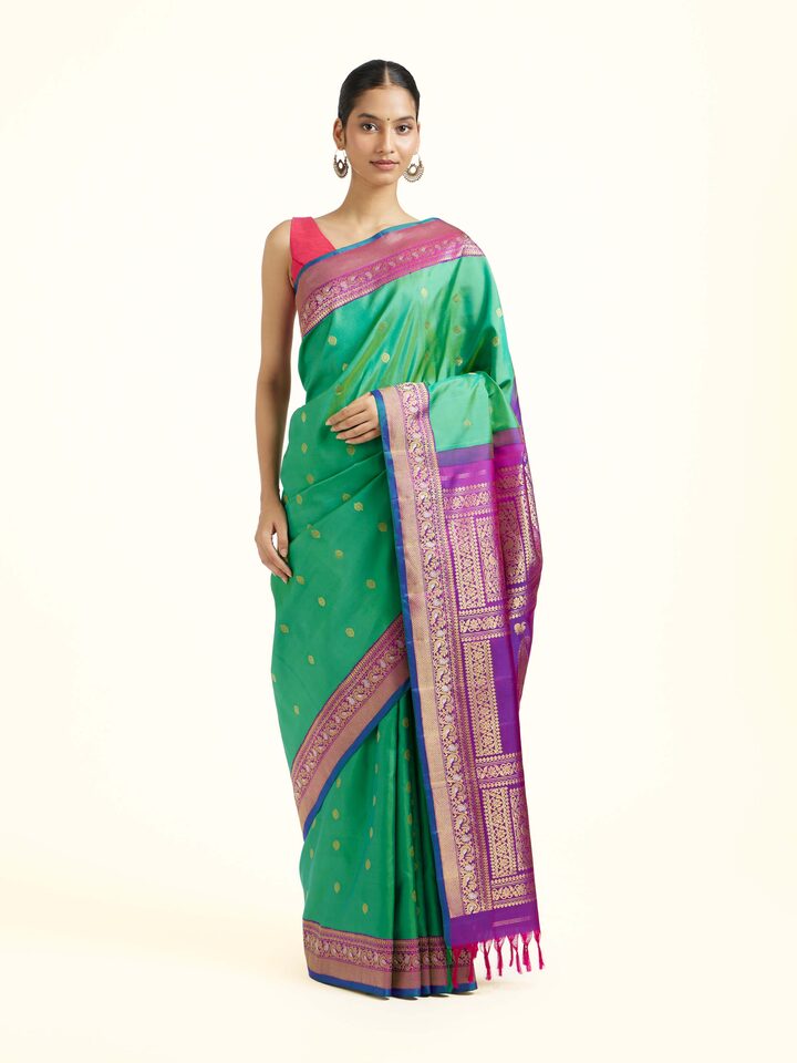 Front view of Green Silk Gadwal Saree showing the full drape and pallu design
