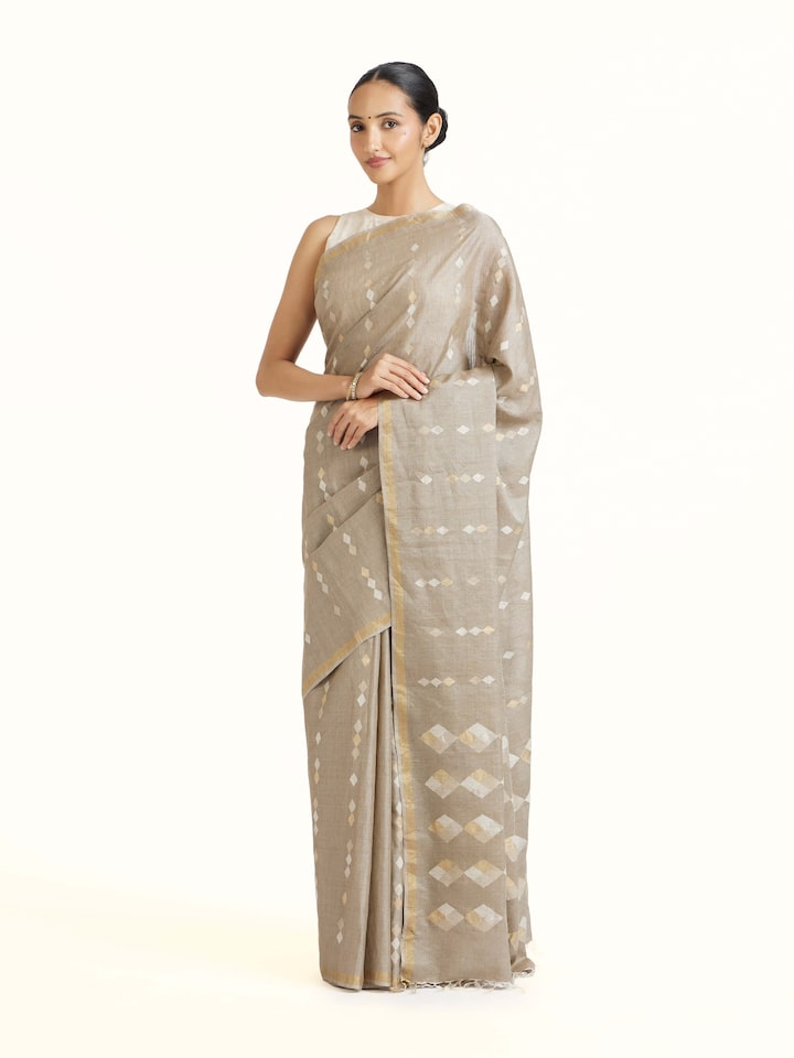 Side view of Light Grey Tussar Silk Saree highlighting the detailed craftsmanship and elegant silhouette