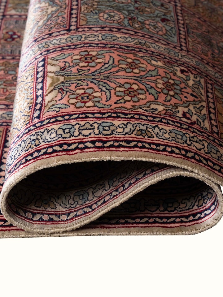 Detail view of Traditional Persian Rust Dabdar Kashmir Silk Hand-Knotted Carpet highlighting the intricate pattern and pile texture, from a differe...
