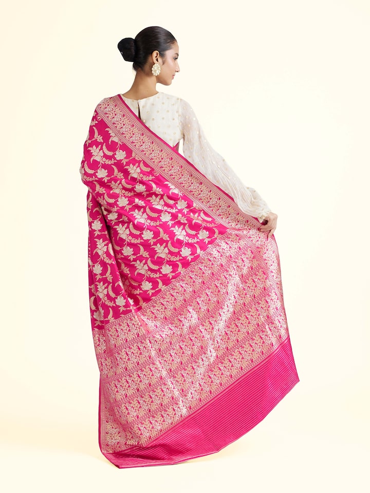 Back view of pink silk Banarasi saree displaying ornate pallu design