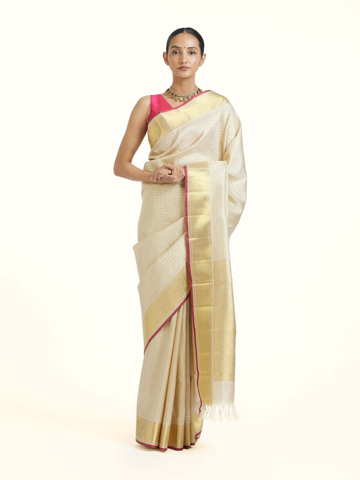 Front view of Beige Kancheepuram Silk Zari Saree showcasing its traditional craftsmanship and design