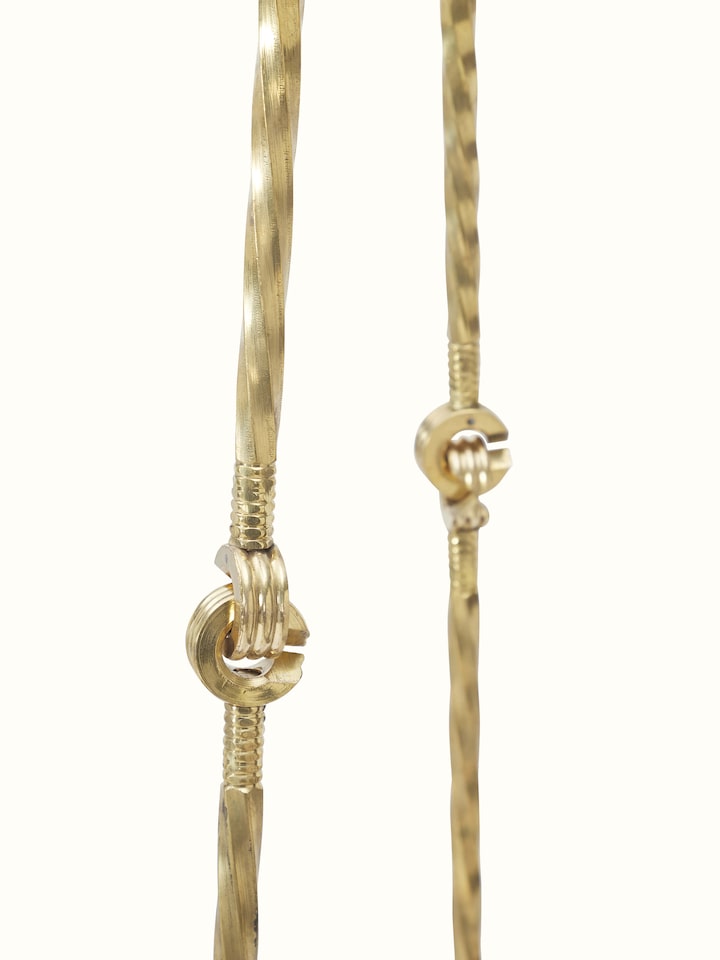 Artistic view of the Sheesham wood and cane swing, showing the overall design and craftsmanship