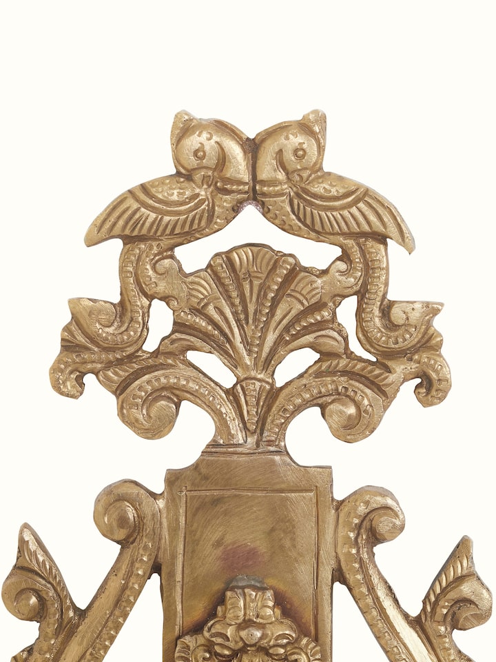 Top view of polished casting hanging diya, emphasizing its intricate patterns and polished surface.