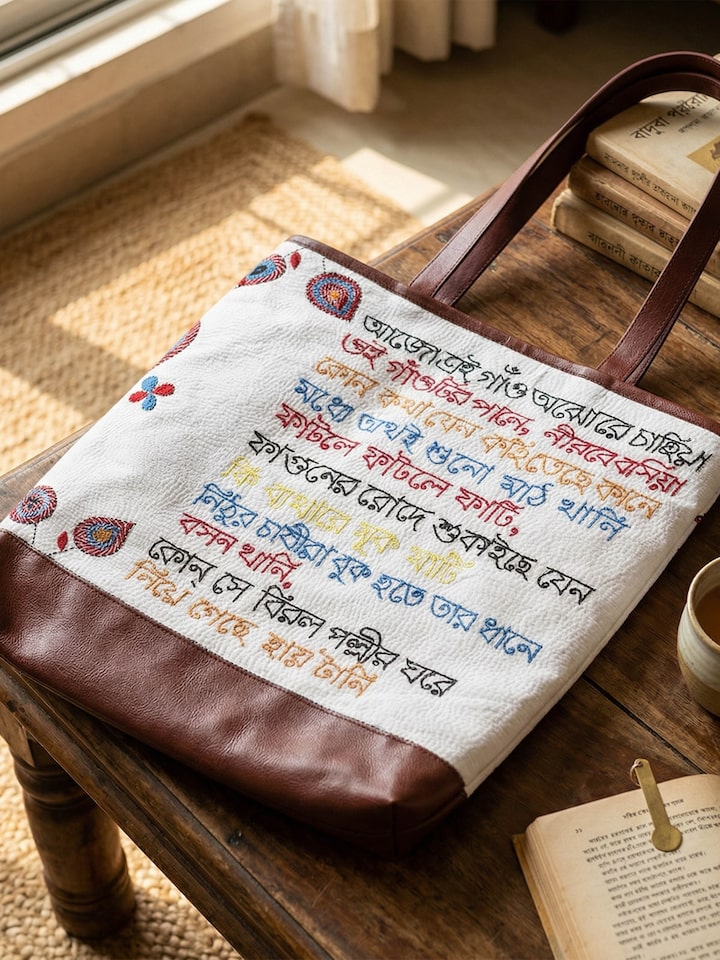 Kantha Embroidered Canvas Tote Bag styled against a window backdrop showing the full bag