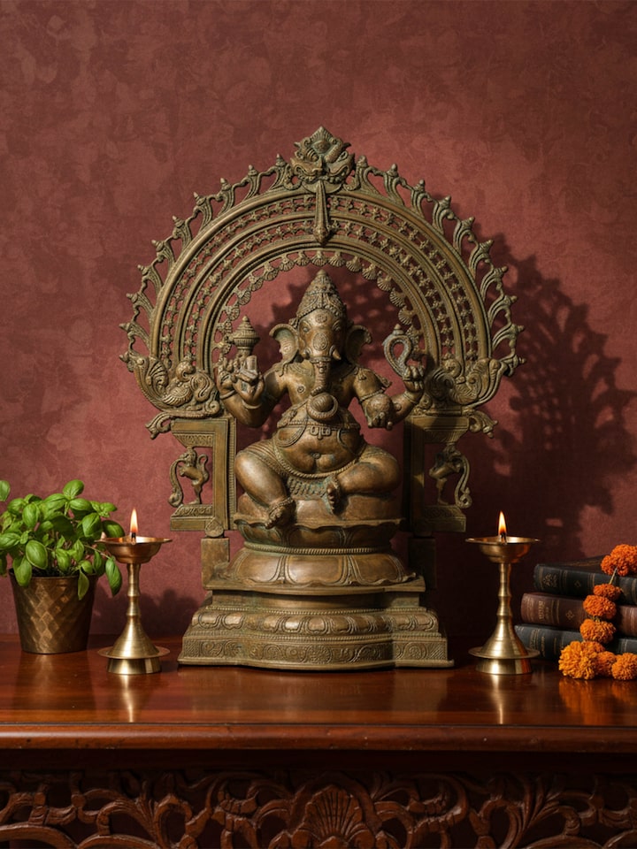 Side view of the Bronze Sitting Ganesha Prabhavali Idol