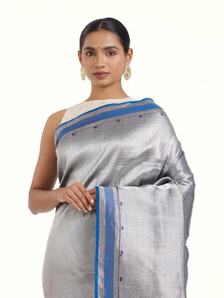 Angled view of Navy Banarasi Brocade Silk Saree revealing the depth of its color and intricate pattern