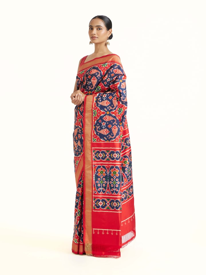 Side view of Navy Double Ikat Silk Saree highlighting the detailed craftsmanship and elegant silhouette