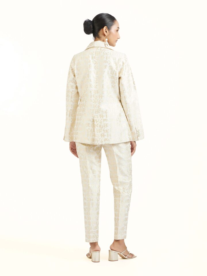 Back view of ivory handloom cut work calligraphy co-ord set displaying complete ensemble