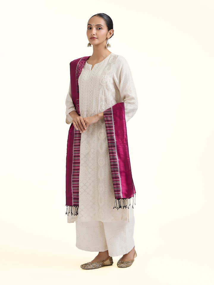 Side view of pink silk Odisha ikat dupatta showcasing handwoven texture