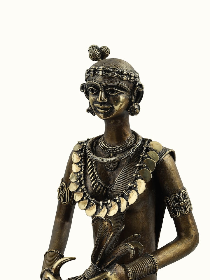 Front detail view of the Dhokra Bastar Couple Brass Sculpture