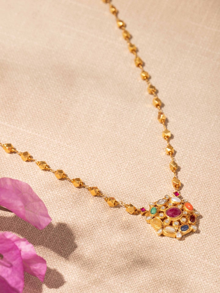 Second lifestyle view of Navratna pendant and chain styled with ethnic dress for a colourful look
