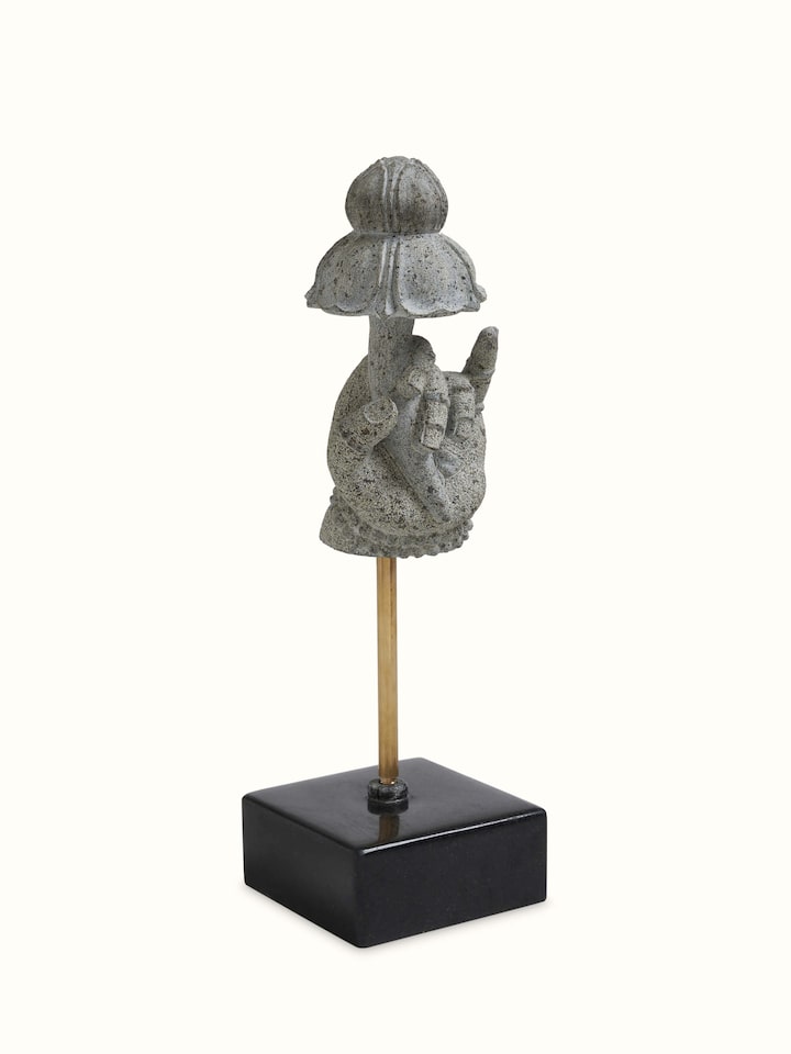 Angled view of the Stone Carved Deity Hand Sculpture
