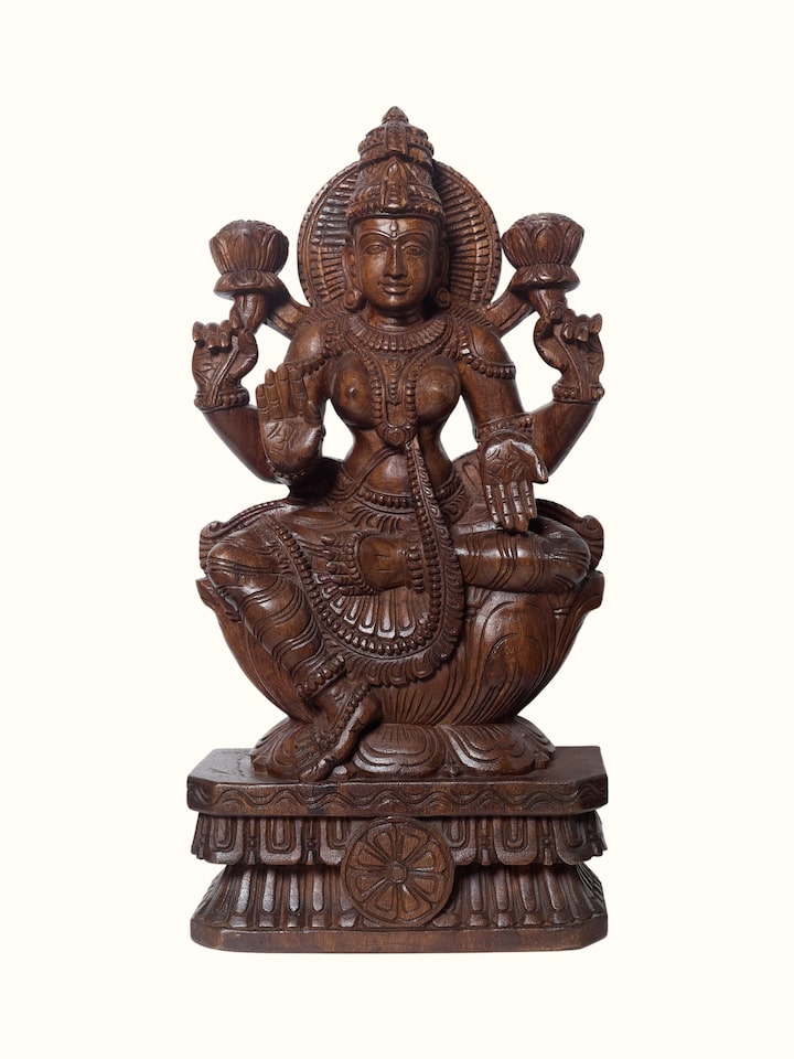 Front view of the Wood Carved Lakshmi Devi Idol