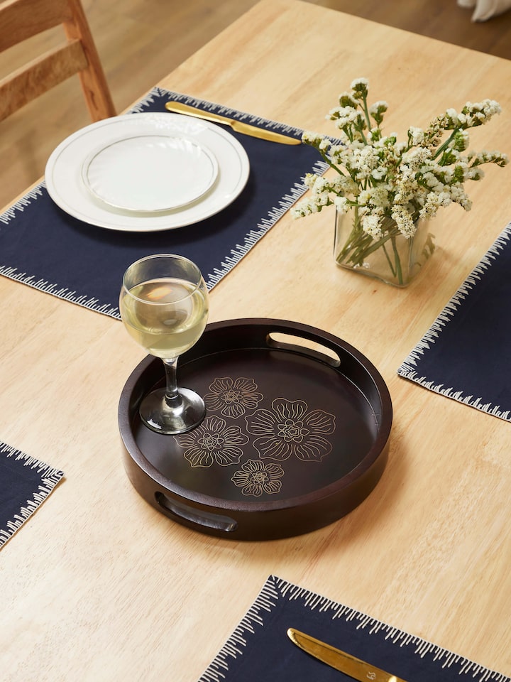 Side view of Tarkashi sheesham wood & brass tray, showcasing the intricate brass inlay and rich wood texture.
