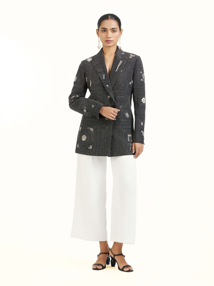 Front view of black silk kantha jacket with hand-stitched embroidery