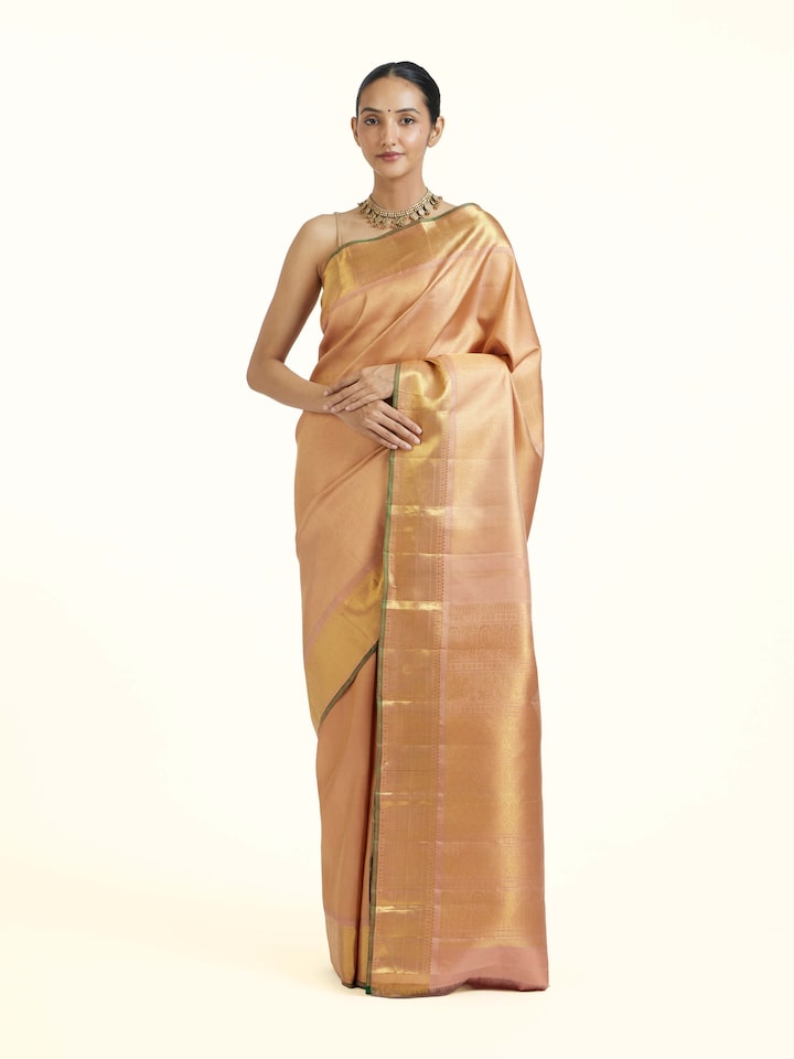 Front view of Pink Kancheepuram Silk Zari Saree showcasing its traditional craftsmanship and design
