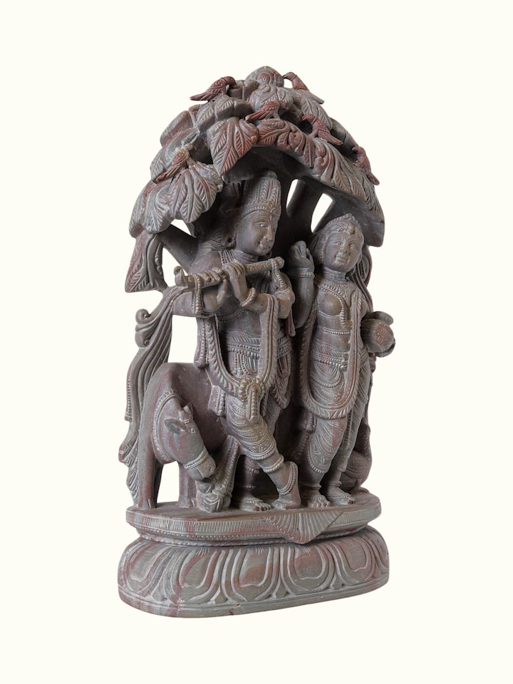 Angled view of the Stone Carved Radha Krishna Idol