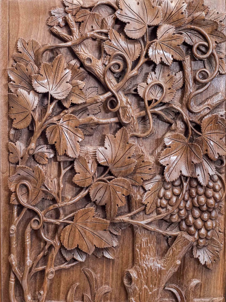Detail view of the Angoor e Chinar Walnut Wood Wall Hanging