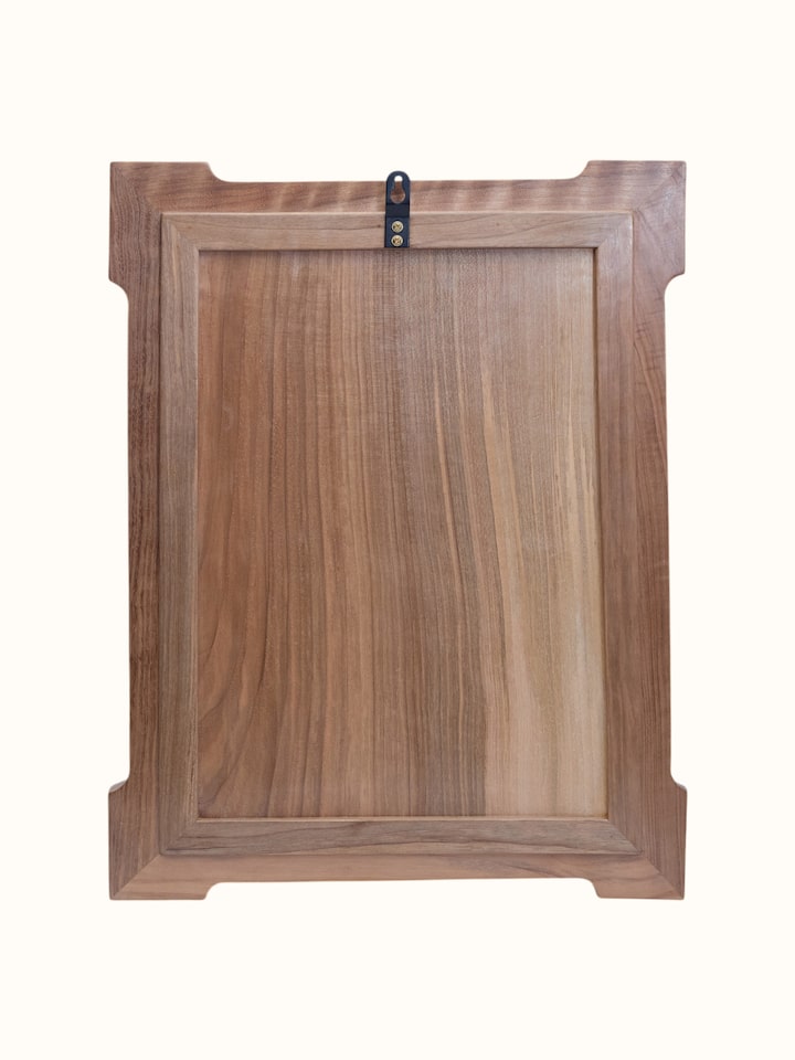Angled view of the Chinar Nama Walnut Wood Wall Hanging