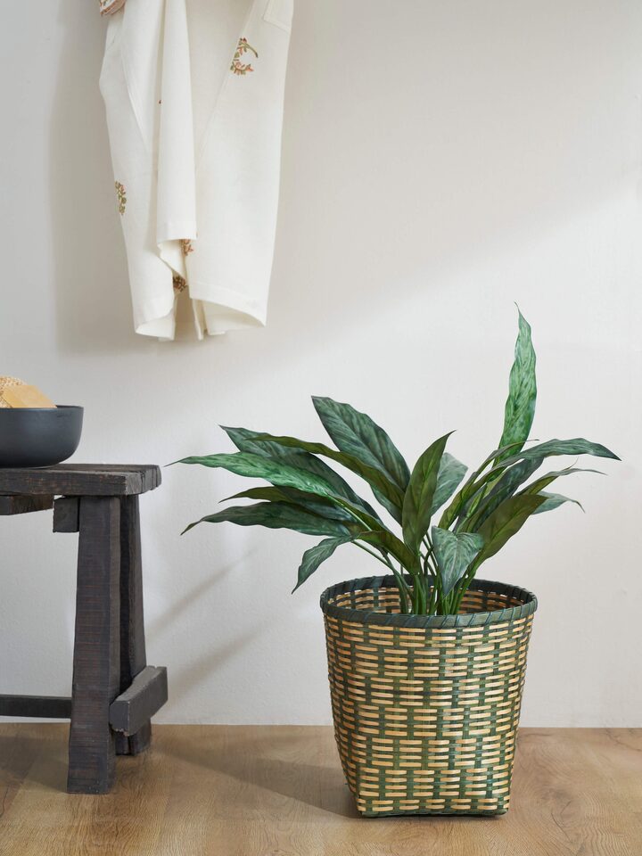 Side view of Green Bamboo Planter highlighting the natural bamboo texture and color depth.