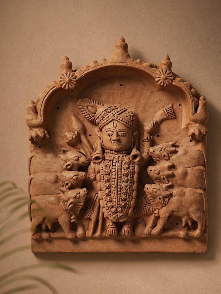 Front view of the Terracotta Clay Shreenath Ji with Cows Idol