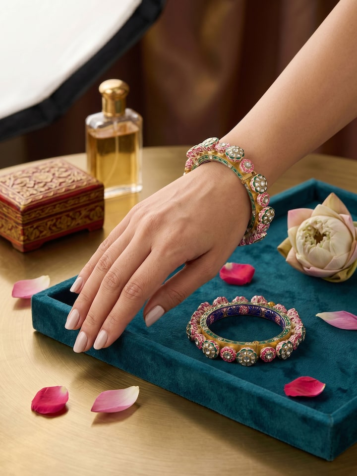 Styled view of Meenakari Nathdwara Silver Gold Plated Bangle worn on the ear, showing how it looks styled