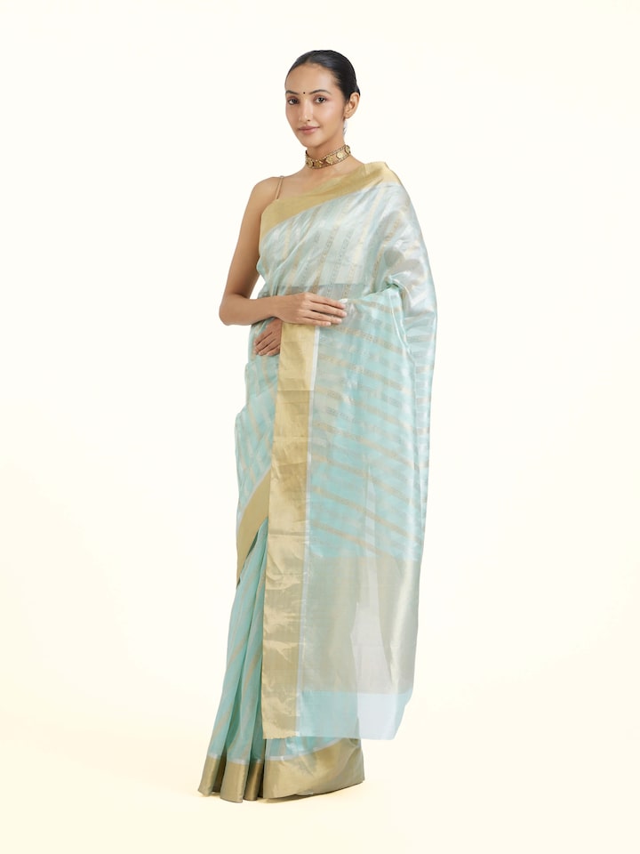 Side view of Light Blue Chanderi Jal Saree highlighting the detailed craftsmanship and elegant silhouette