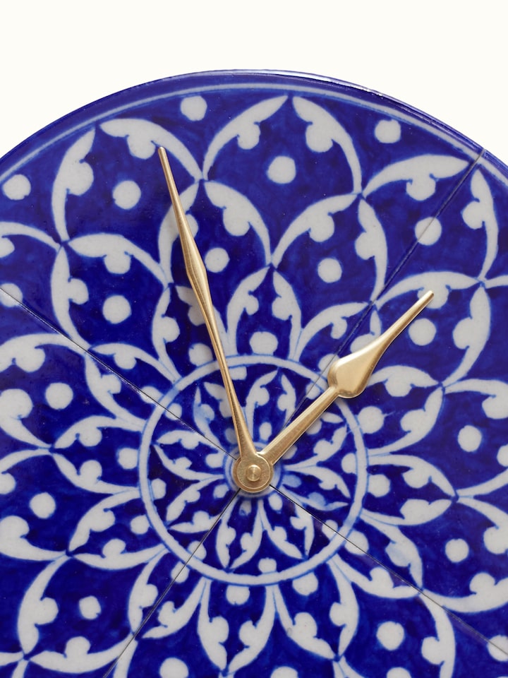 Detail shot of Blue Pottery Ceramic Wall Clock