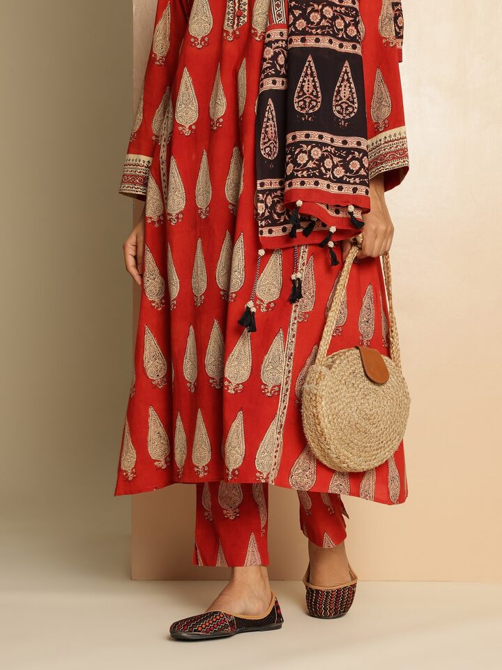 Close-up lifestyle view capturing vibrant red and natural dye Bagru patterns