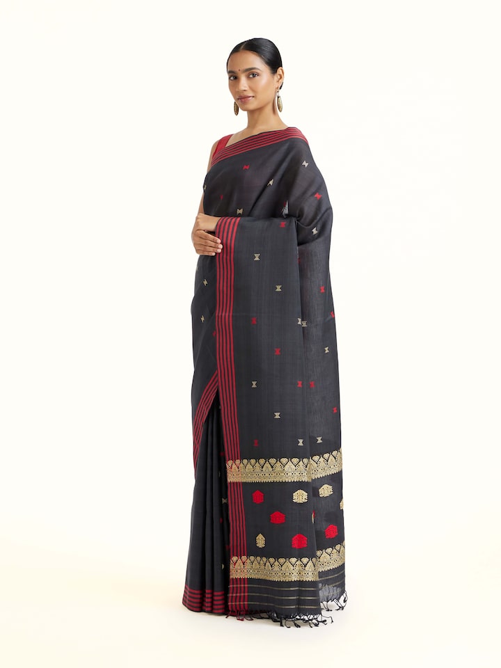 side view of black cotton silk saree drape