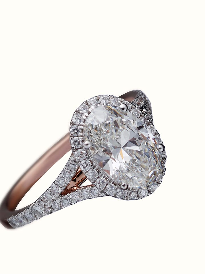 angled view of open setting 14 karat gold ring