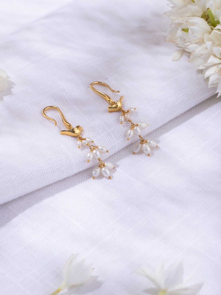 alternate lifestyle view of silver smithing drop earrings