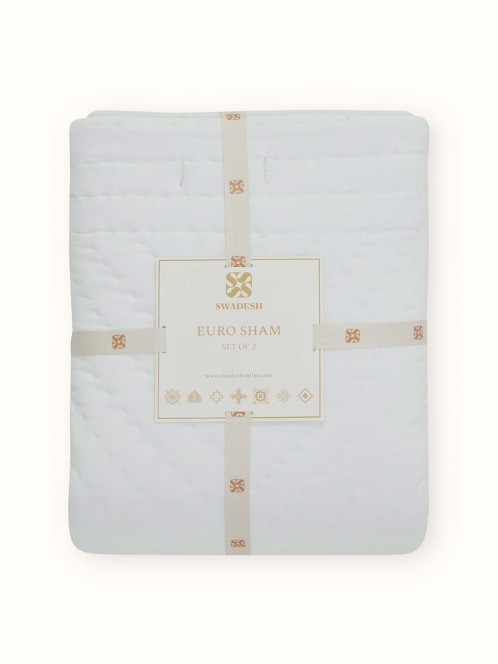 Detailed side view of Kalpanama Ivory Handwoven Buti Euro Shams showing fine cotton texture and weave