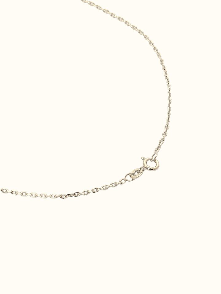 Detail view of Silver Smithing Pendant highlighting the stone setting and metalwork detail