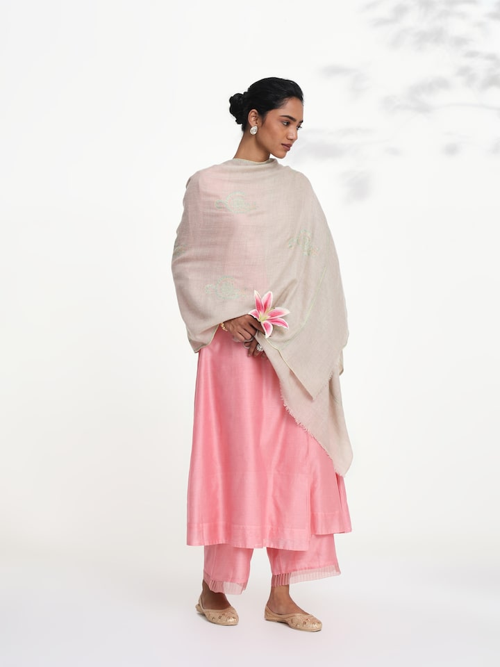 Side view of beige jalidar sozni embroidered stole showcasing fine needlework and drape