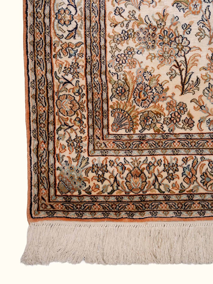 Detail view of Traditional Persian Ivory Mahal Kashmir Silk Hand-Knotted Carpet highlighting the intricate pattern and pile texture