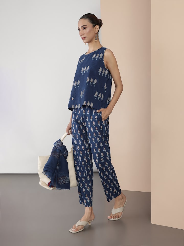 Blue Dabu print cotton pant styled on model, highlighting relaxed fit and ethnic hand-block motifs.